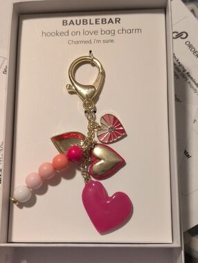 BaubleBar Gold and Pink Multi-Heart Bag Charm